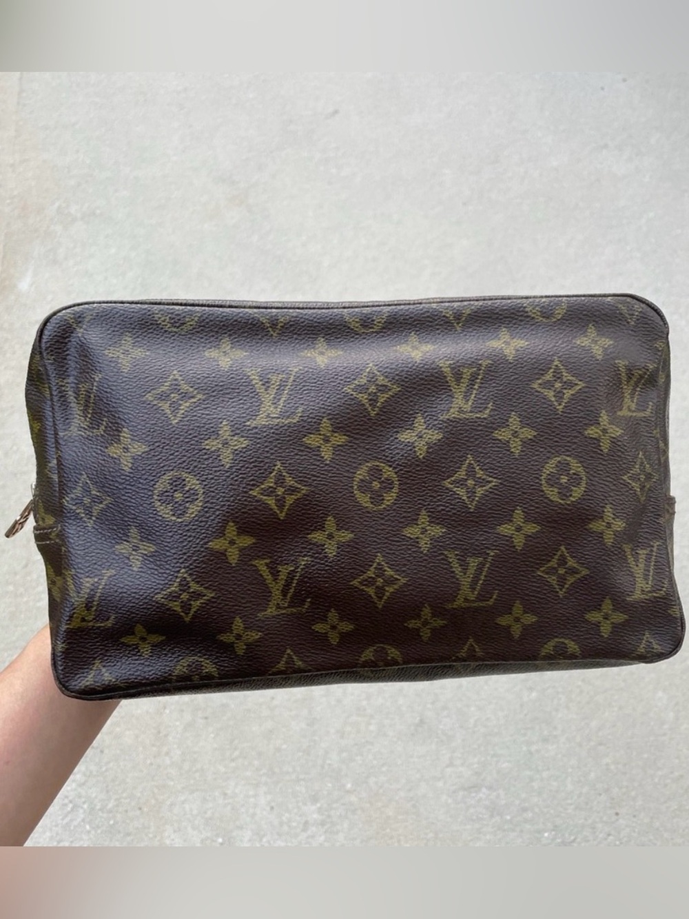 Authentic Louis Vuitton toiletries clutch